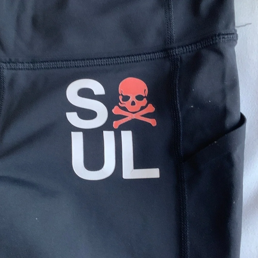Lululemon Athletica Soul cicle capri Black Leggings with Red Skull Design